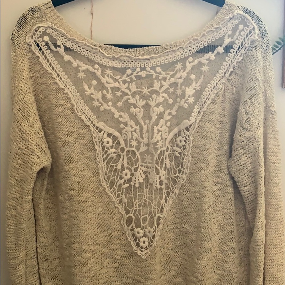 Beautiful knitted sweater with floral open back!